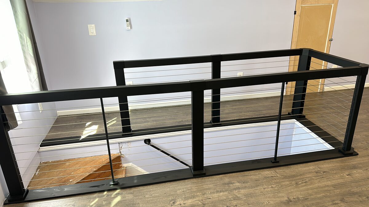 Home addition with modern cable railing